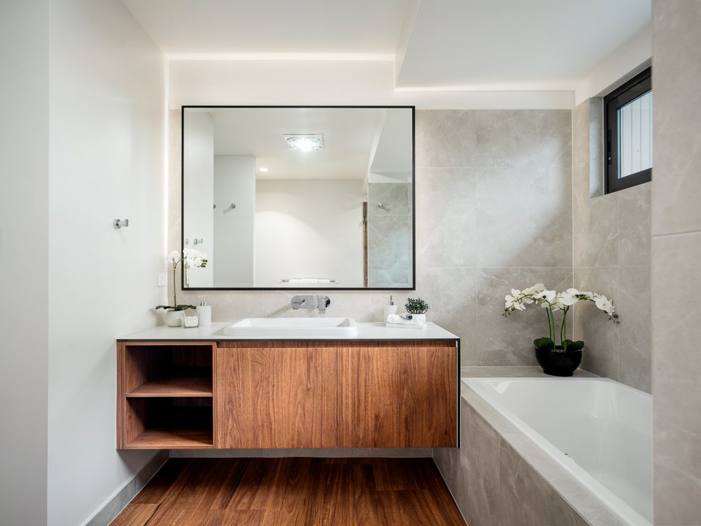 Sustainable-and-eco-friendly-Sherwood-home-by-dion-Deminara-architecture-ensuite-bathroom-with-bathtub-and-vanity
