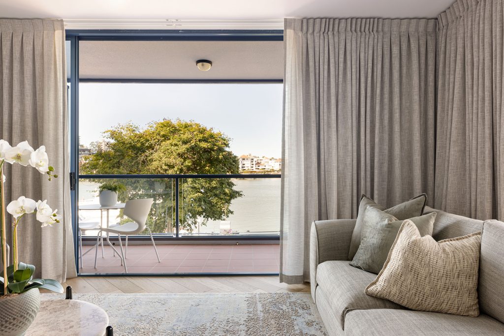 Earthborn by Design - interior - living area with balcony - KP Reno
