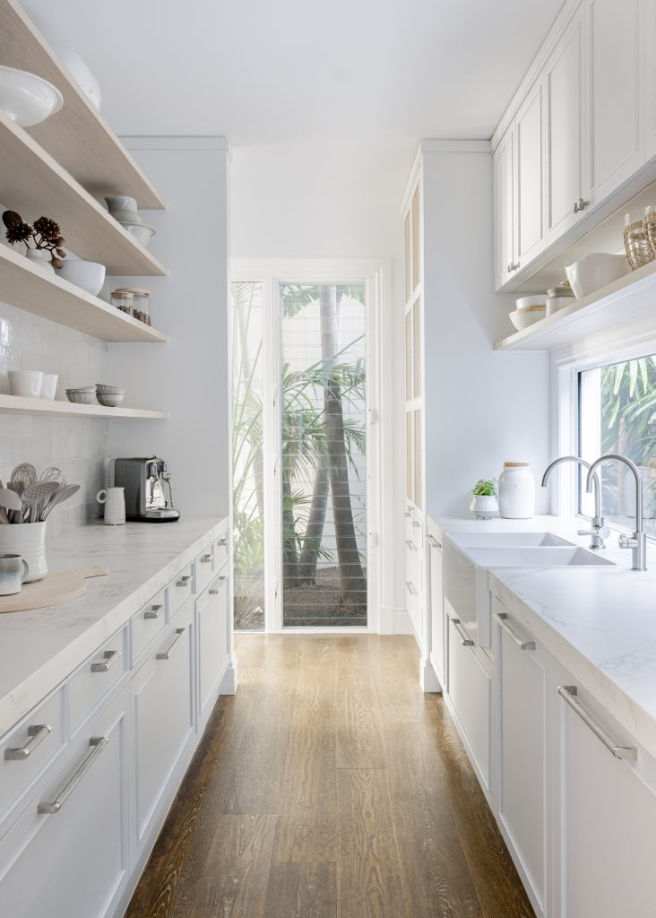 Darren-james-interiors-gold-coast-home-kitchen-walkway-or-hallway-with-cupboards-and-cabinets