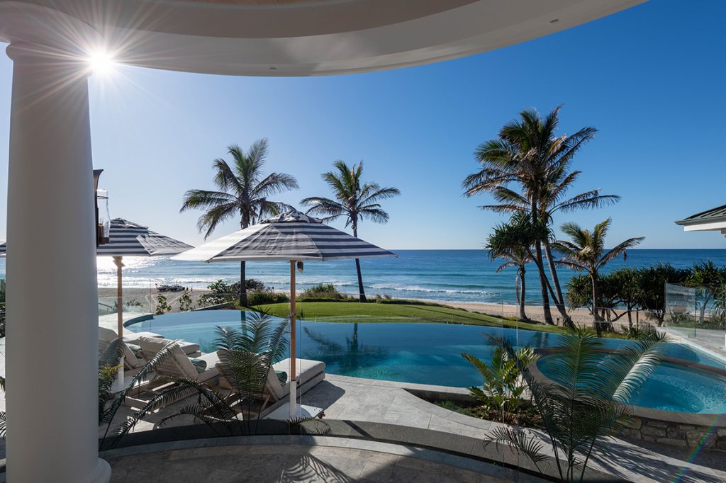 Hampton homes - exterior - swimming pool with views of the beach