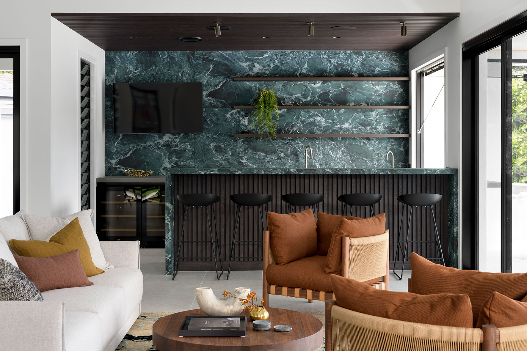 Studio James Interiors - living room and kitchen on the background